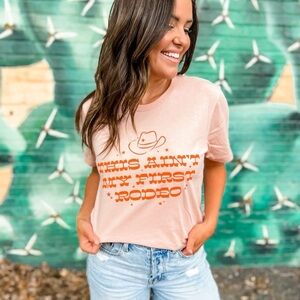 Peach Graphic Tee - 'This Ain't My First Rodeo'